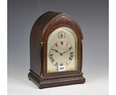 A late Victorian inlaid mahogany lancet top musical quarter chiming bracket clock, movement by Winterhalder & Hofmeier, strik
