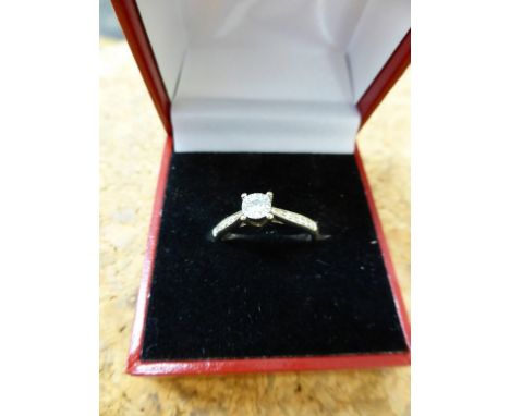 A 9ct white gold and diamond ring, ring size K«.