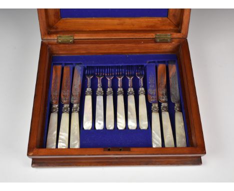 A part cased set of twelve Victorian silver & mother of pearl fruit knives & forks, Henry Wilkinson & Co, Sheffield, 1861, ea