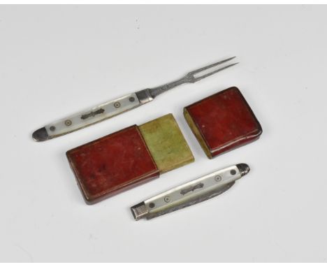 A silver travelling knife and fork set, early 19th century, twin tine fork with chased decoration, knife decorated to spine, 