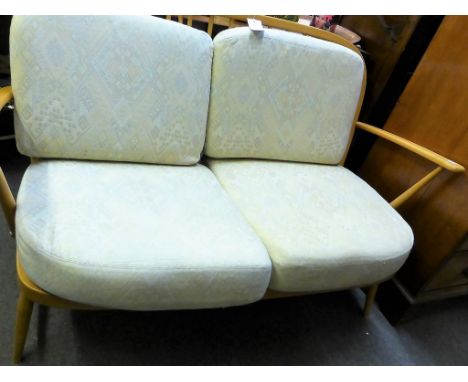 An Ercol Windsor design two seater sofa.