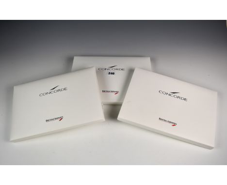 Three British Airways Concorde document cases, one with contents of coasters; postcards; luggage tags; introduction leaflet e