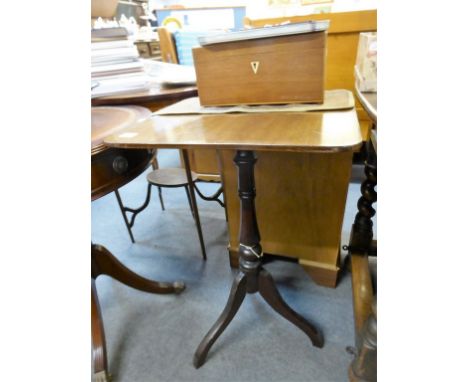 A mahogany tilt top side table.