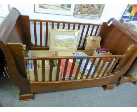 A Simon Horn collection sleigh bed/cot, converts to cot, bed or mini sofa.