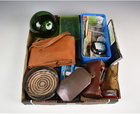 A rummage box, to include fishing reel, flies and accessories; green glass fishing float; Swiss Army knife; polaroid SX-70 la
