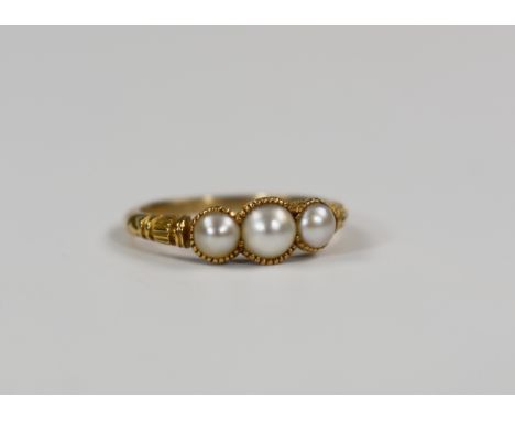 An antique 18ct gold pearl set ring set, ring size M, 