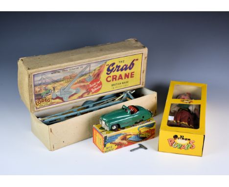 A vintage boxed Tri-ang No. 2 Minic sports car, in green, original key, working horn, excellent/near mint condition together 