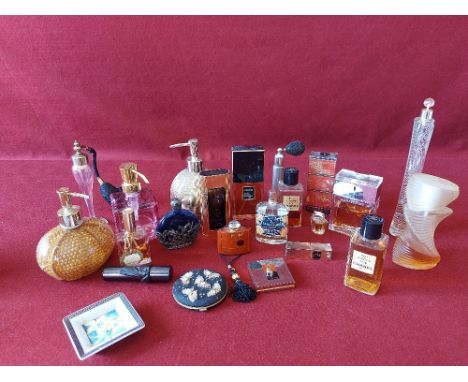 Large collection of vintage perfume bottles with contents, compacts etc.
