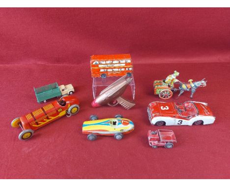 Collection of vintage tinplate and other toys.