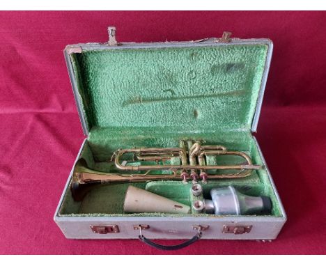 Vintage Corton trumpet with accessories.