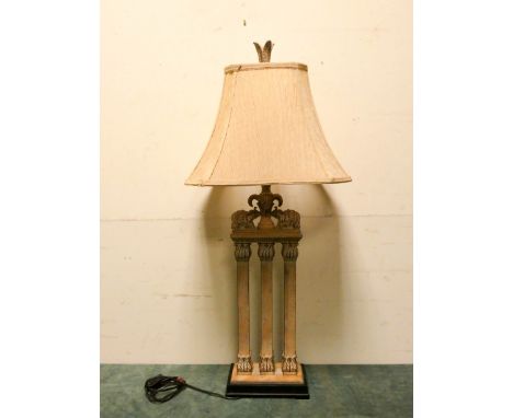 A decorative painted metal three column table lamp with elephant decoration and gold coloured shade, overall height 36" 