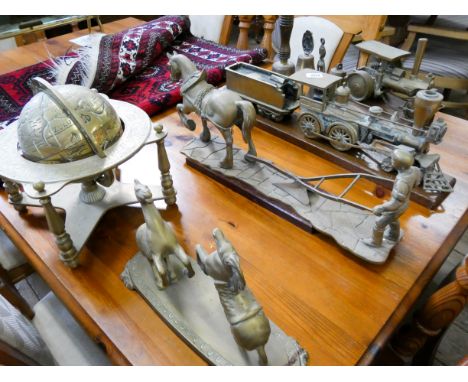 Various large brass ornaments to include ploughman, steam engine, roller, globe, hand bells etc 