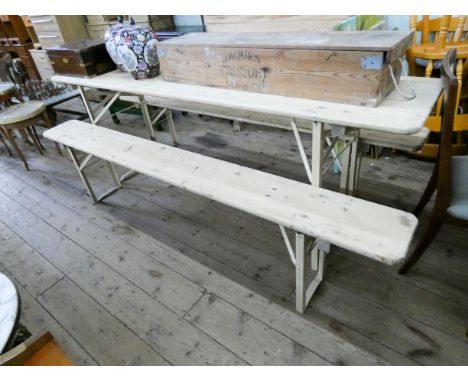 A metal framed stripped pine trestle style table with a pair of matching bench seats 7'3 long and 20" wide 