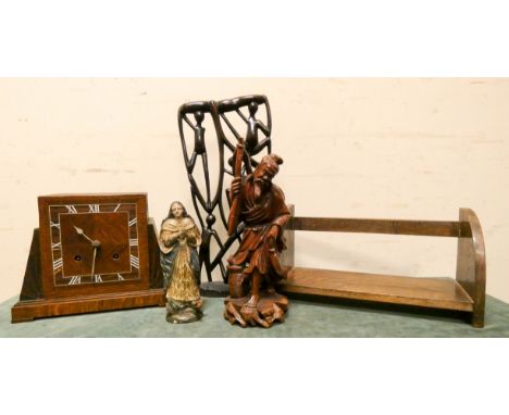 Striking mantle clock in oak case, carved wood sage, religious figure, book rack etc 