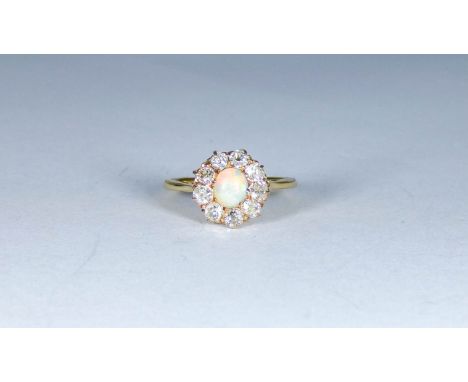 Victorian opal and diamond cluster ring on an 18ct gold shank, unmarked, ring size M 