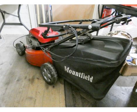 A Mountfield petrol engine lawnmower 