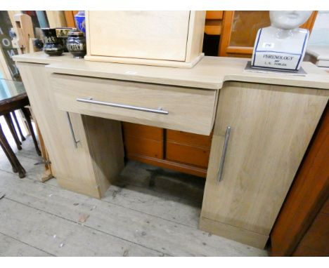 A pale light oak finished break front knee hole sideboard fitted side cupboards and centre drawer 4' wide 