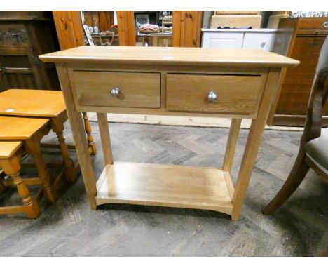 A light oak two tier hall table fitted two drawers 33" wide 