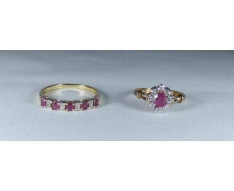 Two 9ct gold ruby and diamond rings, one an oval cluster, the other a half hoop ring size S