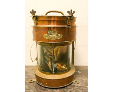 A copper ship's mast head lamp wired for electricity 