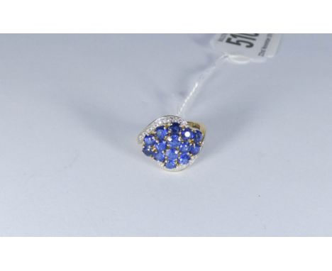 A 9ct gold sapphire and diamond cluster ring size I together with retail replacement valuation for £900  Please note sapphire