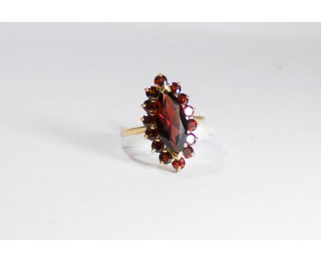 9ct gold garnet cluster ring set in a marquise panel, ring size P/Q