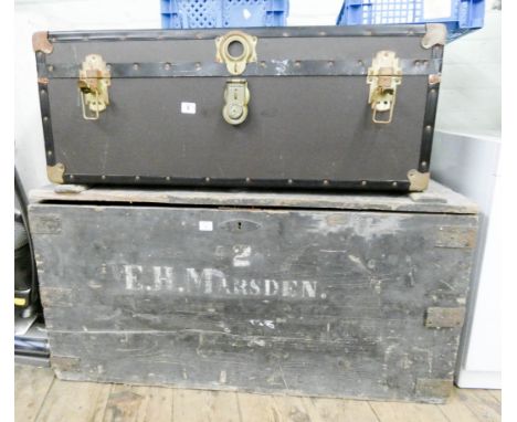 A large old wooden trunk and one other trunk 