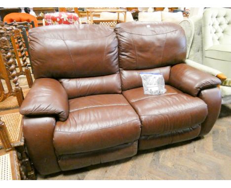 A brown leather two section reclining two seater settee   In fair condition a few scuffs t side, used. Approx 39" floor to to