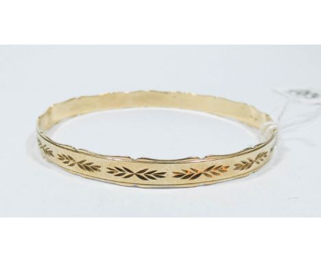 A 9ct yellow gold bangle 10.5 gms weight 