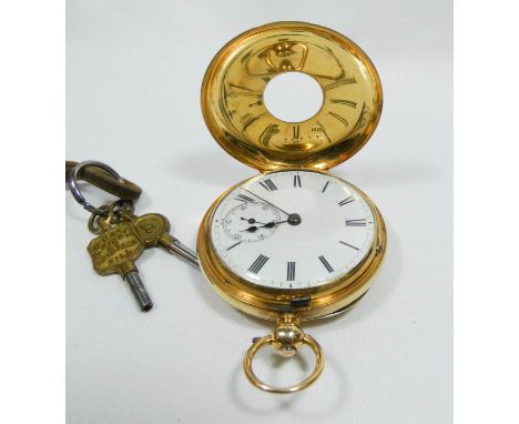 18ct yellow gold half hunter pocket watch, the case with blue enamel numerals, the white dial having subsidiary seconds dial,