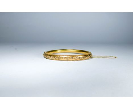 A Victorian 9ct yellow gold ladies hinged bangle 8gms
