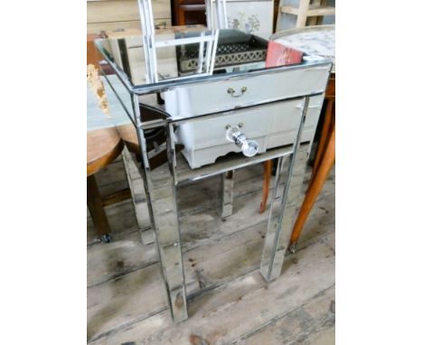 A mirrored lamp table fitted drawer 