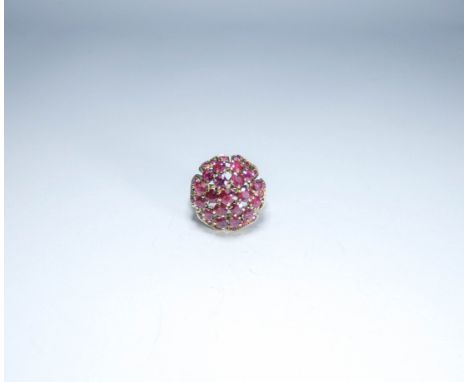 Large ruby cluster cocktail ring on a 14ct yellow gold cage setting, ring size L 