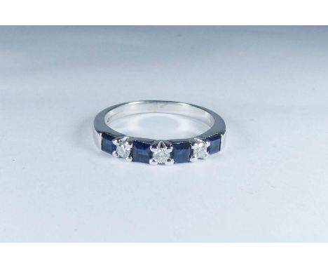 An 18ct white gold sapphire and diamond half hoop eternity ring, ring size O 