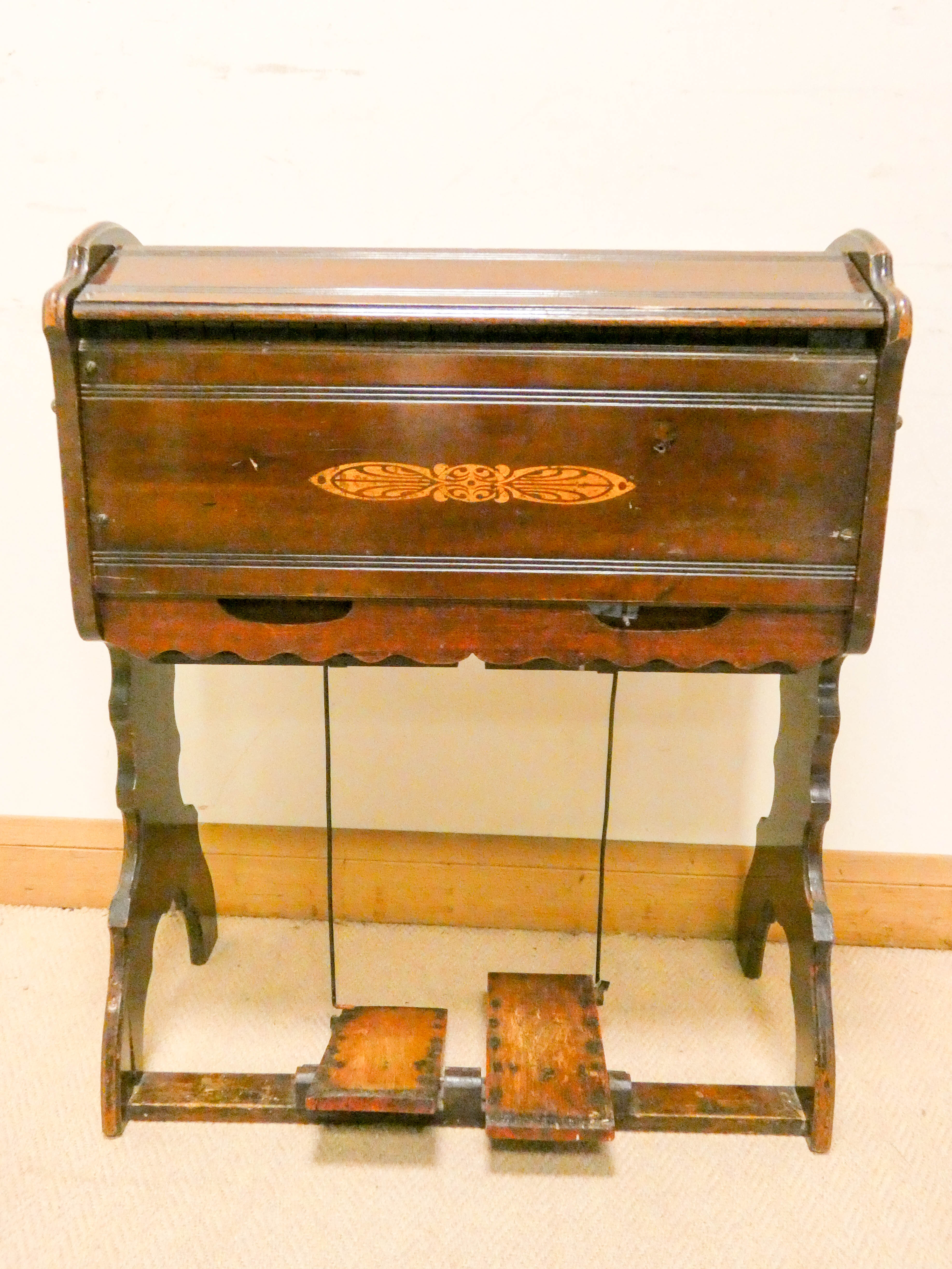 A small Edwardian pedal harmonium by Boyd of London , 27" wide