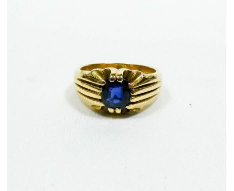 Gents 18ct yellow gold signet ring set with a large blue sapphire in claw setting, ring size S, hallmarked, weight 13.7 grams