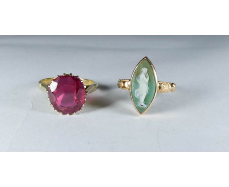 Large oval mix cut synthetic ruby in an 18ct yellow claw setting and shank, ring size K, together with antique rose gold moun