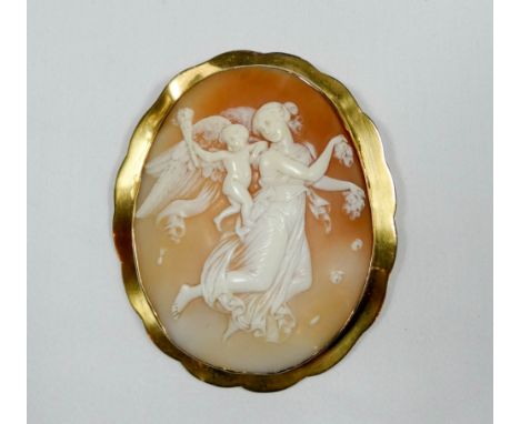 19th century large oval carved shell cameo brooch, cameo depicts the goddess of Dawn, Aurora, accompanied by the Genius of Li