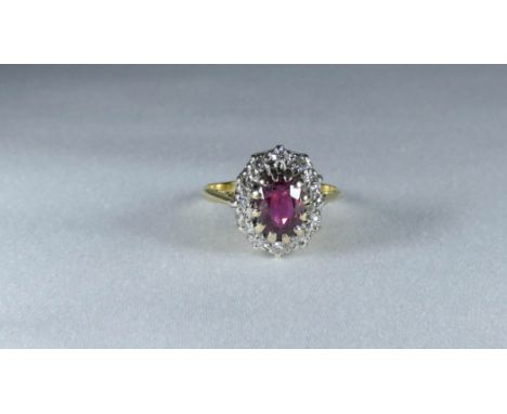 Oval ruby and diamond cluster ring, on 18ct yellow gold shank, ring size L