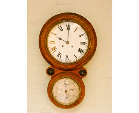 A Victorian drop dial style striking wall clock with attached barometer under 