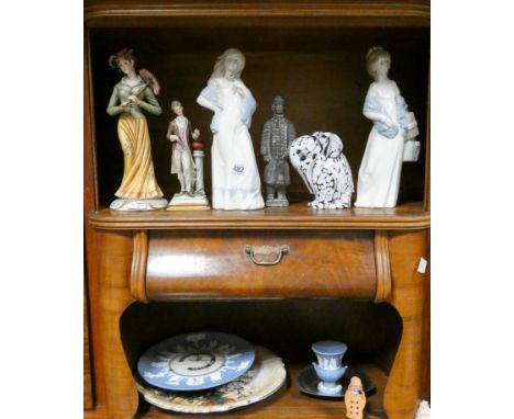 A pair of Lladro style figures, bisque figures, Wedgwood barometer, large plate and other ornaments 