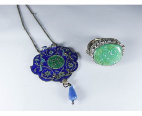 Persian enamelled pendant on chain and a large white metal ring set with oval green stone    some enamel losses to pendent 