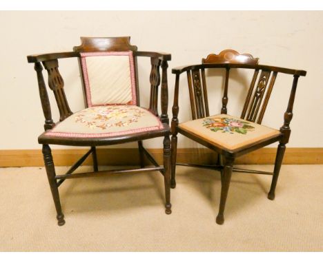 Two Edwardian inlaid mahogany elbow chairs with tapestry upholstered seats 