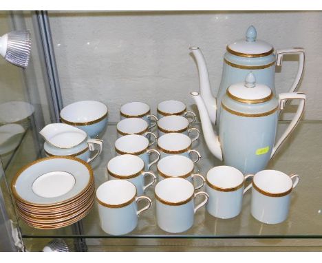 A Royal Worcester powder blue coffee service, faults to both pots handles