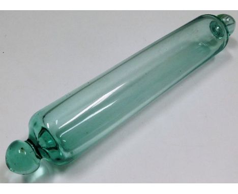 An antique glass rolling pin 1in long 