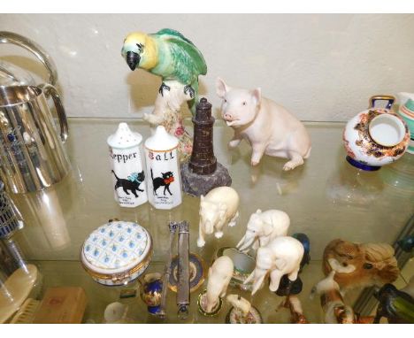 A Beswick budgie 6.5in tall, a John Aynsley pig twinned with a serpentine lighthouse, a Hessenford salt &amp; pepper pot &amp