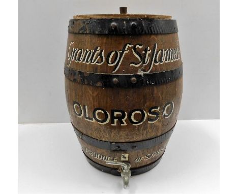 A vintage Grants of St. James oak cased coopered barrel 18in high x 15in diameter 