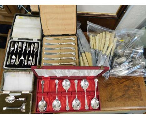 A boxed set of six silver plated cake knives twinned with other plated &amp; metal flatware 