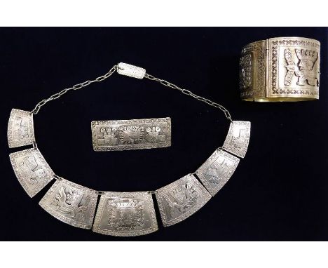 A South American silver bracelet, necklace &amp; brooch set with Inca style decor approx. 189g