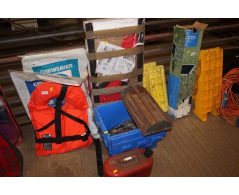 A shelf kit together with a box of various spanners etc. and a fuel can etc.